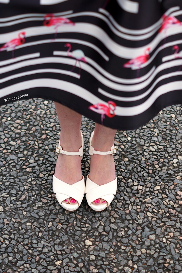 Winnipeg Style fashion stylist, Chie Mihara Gada white retro vintage sandal, Chicwish striped pink flamingo midi full skirt, Flamingo bag purse, Chicwish black white sweater, Paris Disneyland cafe minnie pin, women